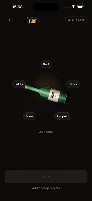 Tuvro in play: the bottle spins, lands on two names and reveals their task